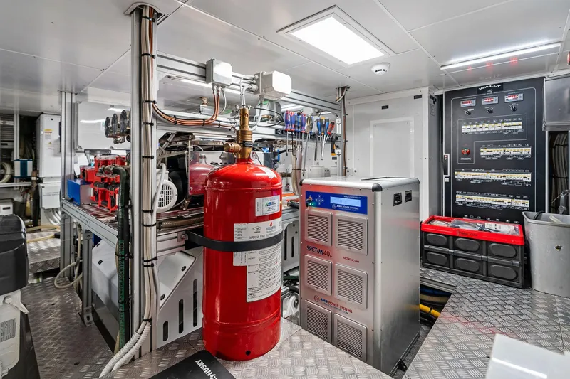 Matzu II Yacht Photos Pics Engine room of 2023 Wally WHY 150 yacht, featuring advanced equipment and control panels.