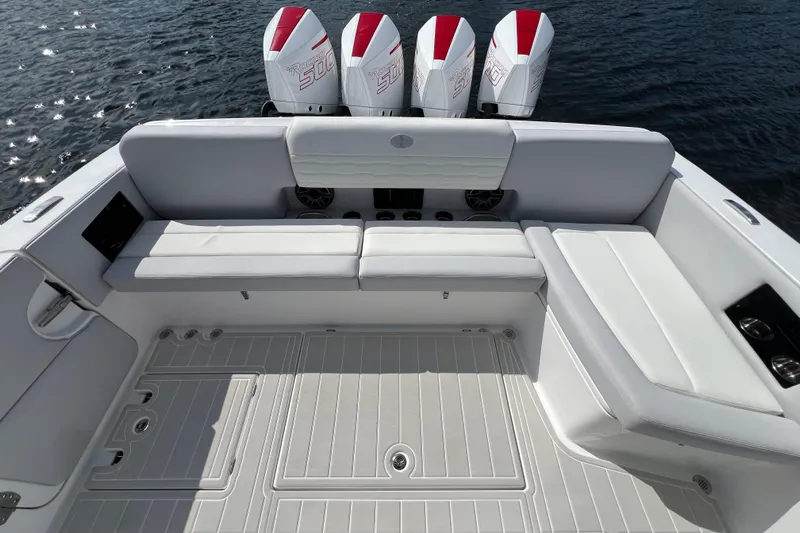  Yacht Photos Pics 2025 Cigarette 41 Nighthawk boat interior with white seating and four powerful engines.