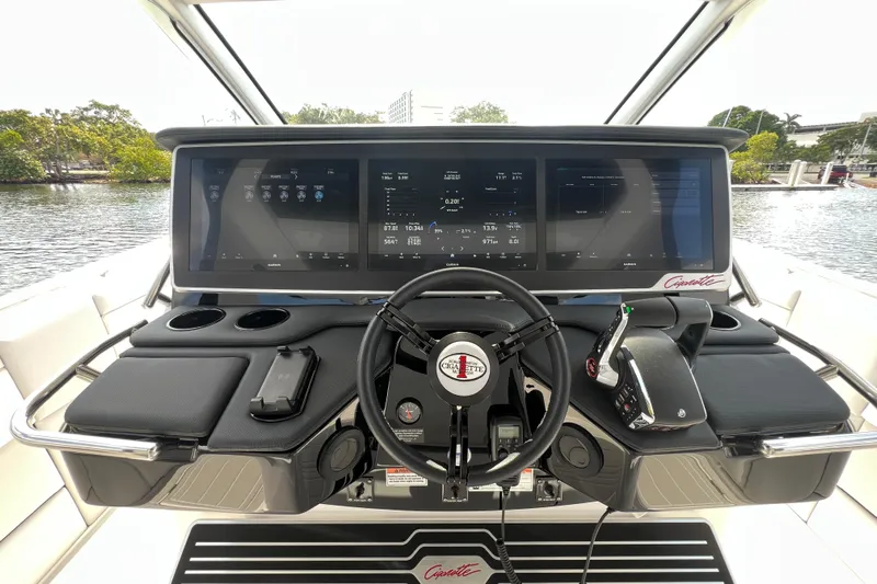  Yacht Photos Pics 2025 Cigarette 41 Nighthawk boat dashboard with advanced navigation screens and controls.