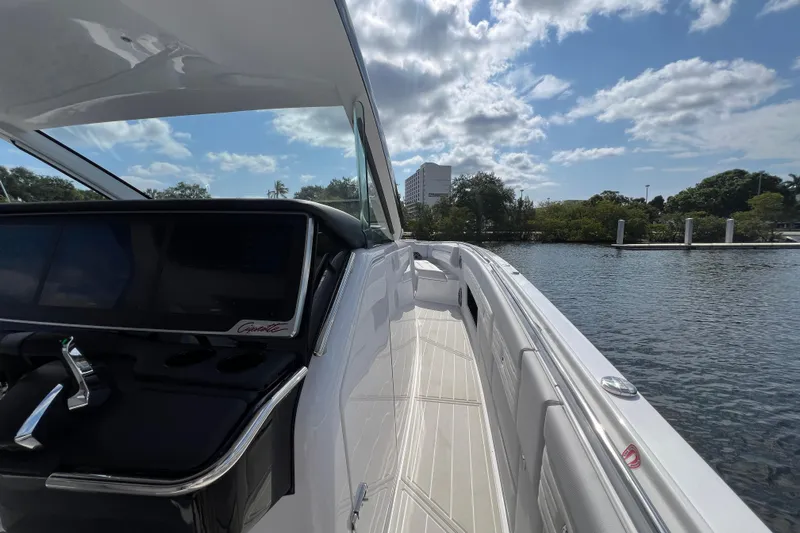  Yacht Photos Pics 2025 Cigarette 41 Nighthawk boat on water, featuring sleek design and modern controls.