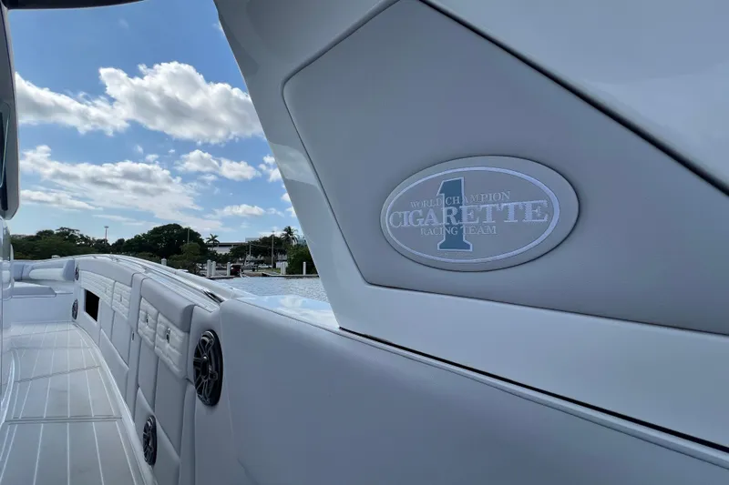  Yacht Photos Pics 2025 Cigarette 41 Nighthawk boat interior with logo, showcasing luxury design.