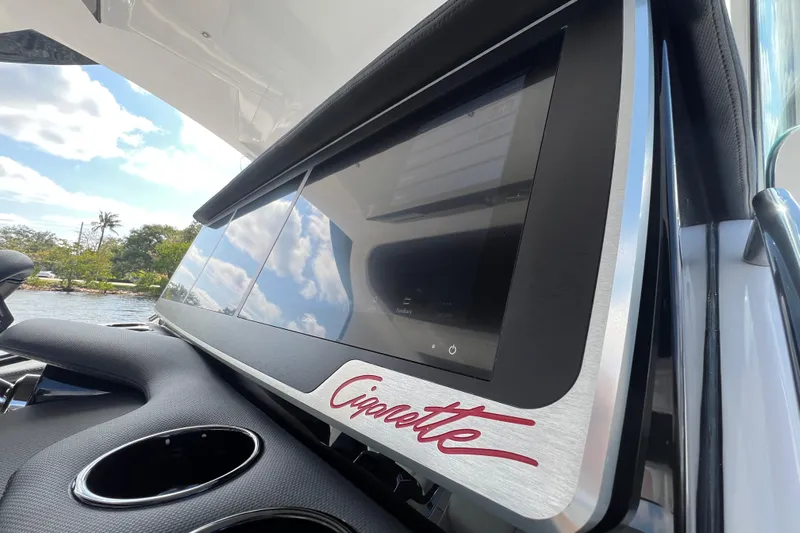  Yacht Photos Pics 2025 Cigarette 41 Nighthawk dashboard with touchscreen display and sleek design.
