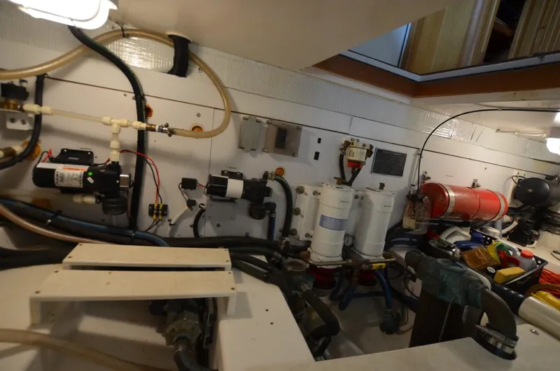 O Henry Yacht Photos Pics Engine room of 2006 Legacy Yachts Sedan, showcasing mechanical components and systems.