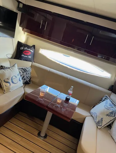 B Seaductive Yacht Photos Pics Luxurious interior of 2014 Regal 42 Sport Coupe with elegant seating and decor.
