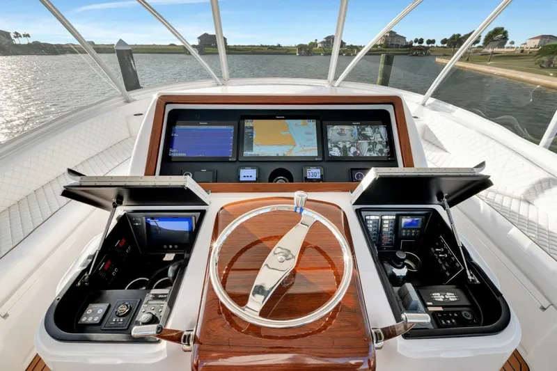 Desparado Yacht Photos Pics 2019 Viking 68 Convertible yacht helm with advanced navigation displays and controls.