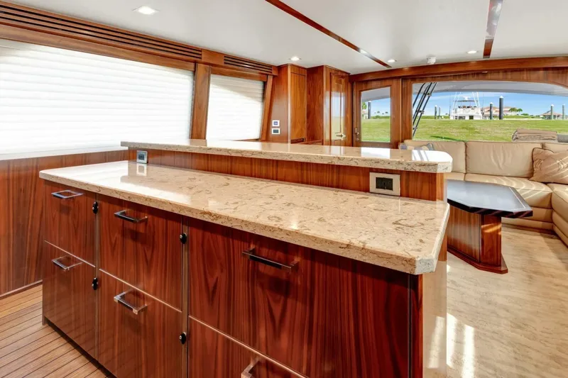 Desparado Yacht Photos Pics Luxurious interior of 2019 Viking 68 Convertible yacht with elegant wood finishes.