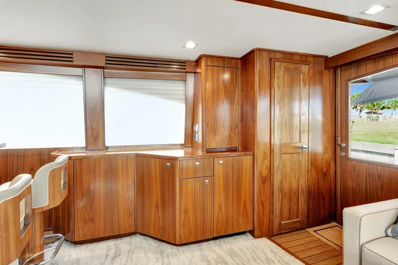 Desparado Yacht Photos Pics Luxurious wood interior of 2019 Viking 68 Convertible yacht with modern design elements.