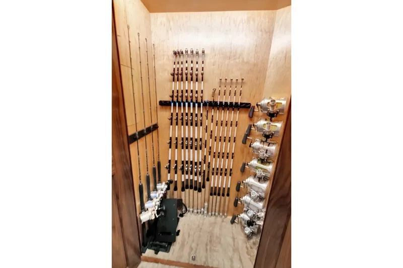 Desparado Yacht Photos Pics Fishing rod storage on 2019 Viking 68 Convertible yacht, featuring multiple rods and reels neatly organized.