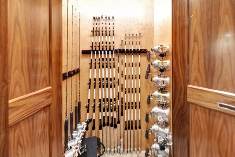 Desparado Yacht Photos Pics Fishing rod storage on 2019 Viking 68 Convertible yacht, featuring neatly organized rods and reels.