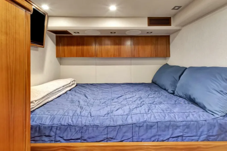 Desparado Yacht Photos Pics Luxurious cabin interior of 2019 Viking 68 Convertible yacht with cozy bedding.
