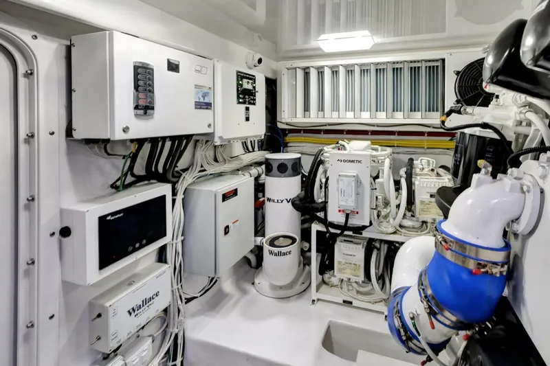 Desparado Yacht Photos Pics Engine room of 2019 Viking 68 Convertible yacht, showcasing advanced equipment and systems.