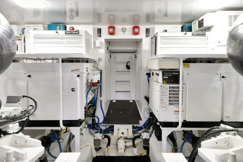 Desparado Yacht Photos Pics Engine room of 2019 Viking 68 Convertible yacht with Cummins Onan generators and Craftsman toolboxes.