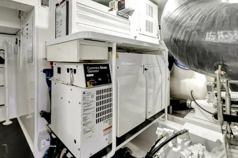 Desparado Yacht Photos Pics Engine room of 2019 Viking 68 Convertible yacht with Cummins Onan generator.