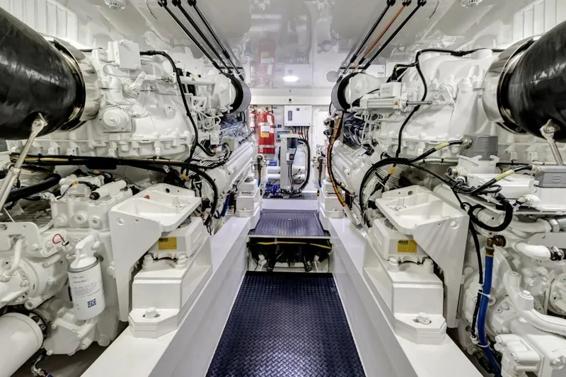 Desparado Yacht Photos Pics Engine room of 2019 Viking 68 Convertible yacht, showcasing dual powerful engines.