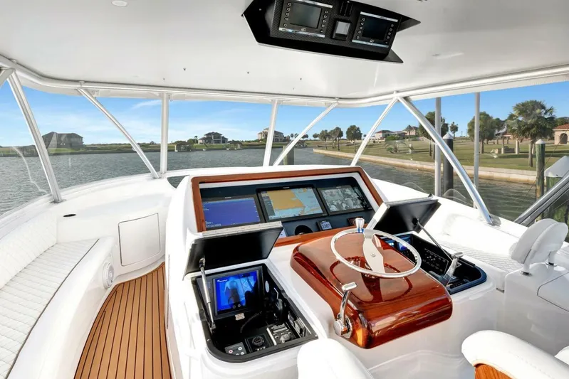 Desparado Yacht Photos Pics Luxurious 2019 Viking 68 Convertible yacht helm with advanced navigation systems.