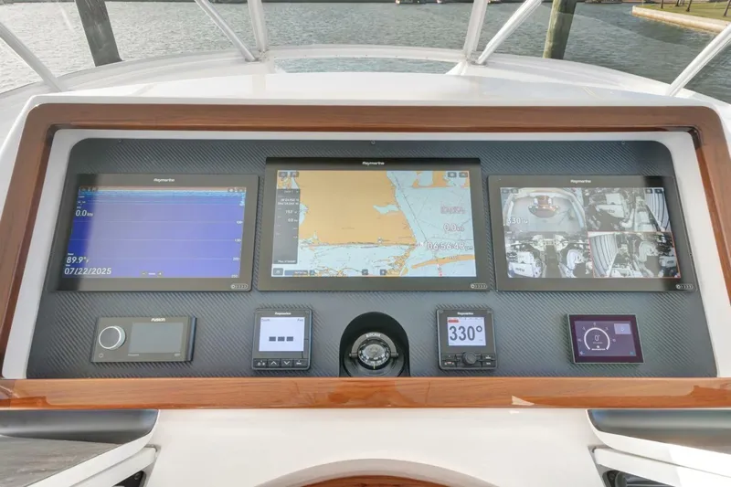 Desparado Yacht Photos Pics 2019 Viking 68 Convertible yacht dashboard with navigation and control displays.
