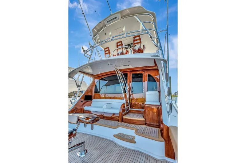 Desparado Yacht Photos Pics 2019 Viking 68 Convertible yacht with polished wood accents and spacious deck.