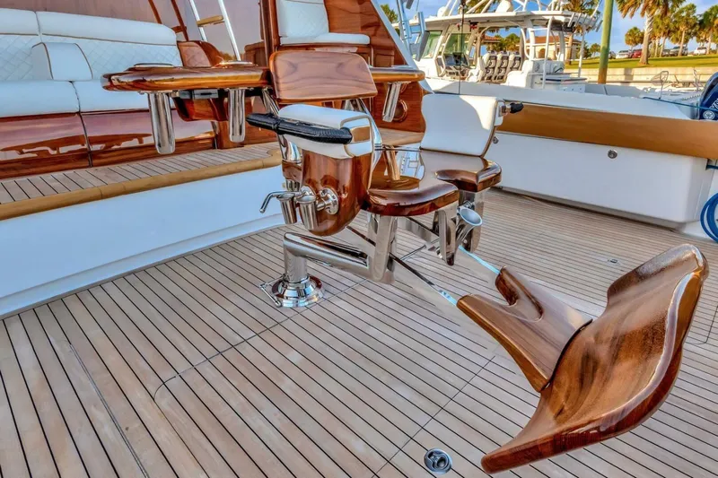 Desparado Yacht Photos Pics Luxurious 2019 Viking 68 Convertible yacht with polished wood and chrome fishing chair.