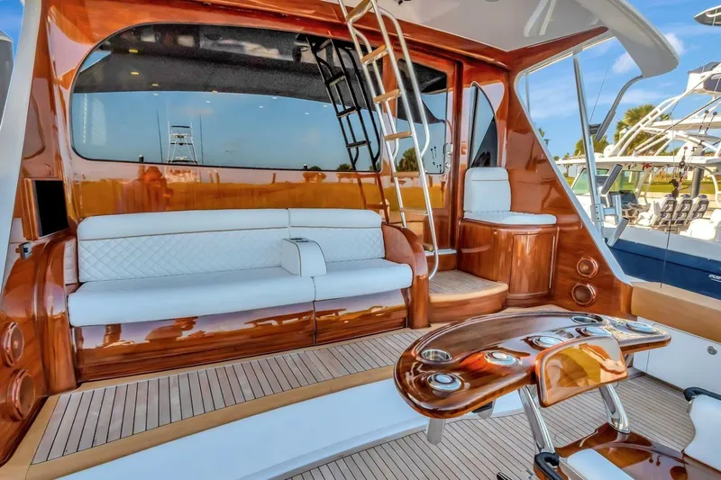 Desparado Yacht Photos Pics Luxurious 2019 Viking 68 Convertible yacht interior with elegant seating and polished wood finishes.