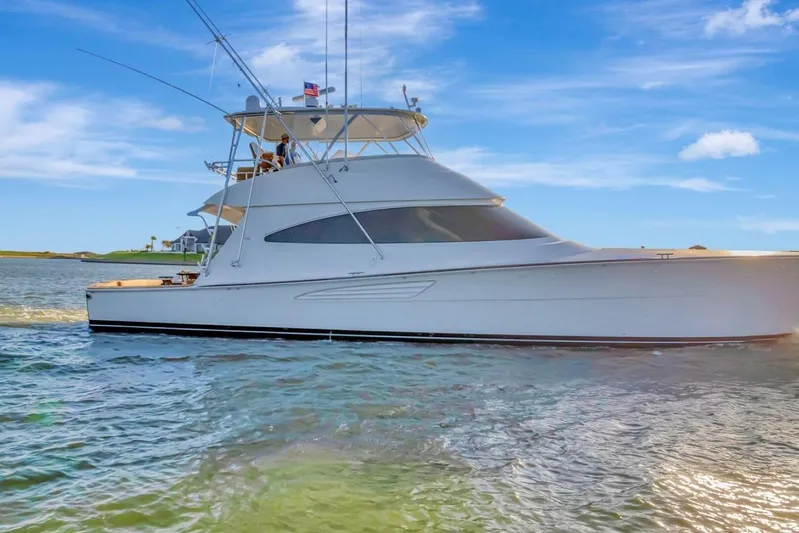 Desparado Yacht Photos Pics 2019 Viking 68 Convertible yacht cruising on a sunny day.