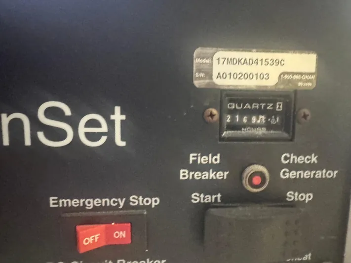 Audrey IV Yacht Photos Pics Control panel of a Hatteras 50 Convertible 2002 with emergency stop and generator check.