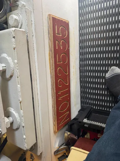 Audrey IV Yacht Photos Pics Hatteras 50 Convertible 2002 interior with red plaque displaying "NO 2255".