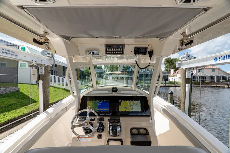  Yacht Photos Pics Interior view of 2019 Scout 320 LXF boat with advanced navigation system.