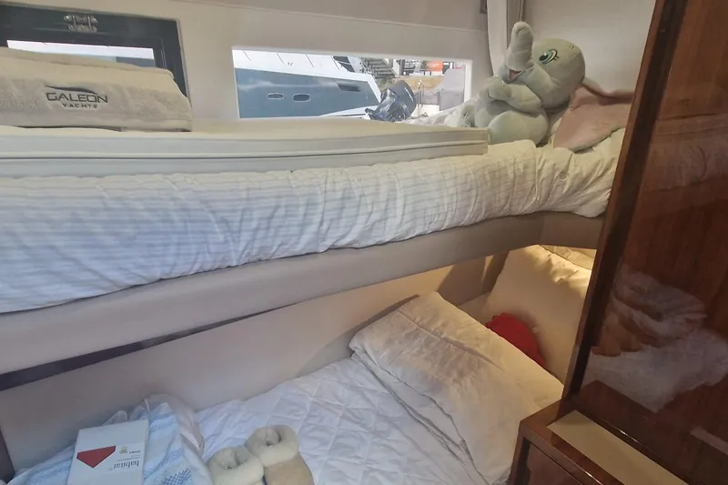 Alouise Yacht Photos Pics Bunk beds in 2022 Galeon 460 Fly yacht cabin with plush elephant toy.
