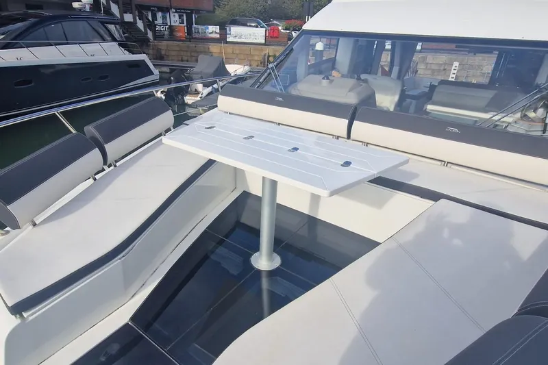 Alouise Yacht Photos Pics Luxurious seating area on 2022 Galeon 460 Fly yacht with sleek design.