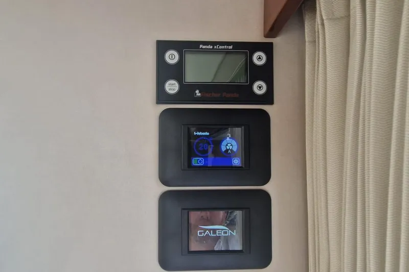 Alouise Yacht Photos Pics Control panels inside 2022 Galeon 460 Fly yacht, featuring digital displays and buttons.