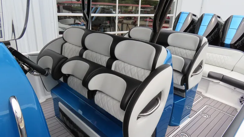  Yacht Photos Pics 2023 Nor-Tech 390 Sport Center Console interior with luxurious seating and modern design.