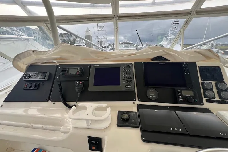  Yacht Photos Pics 1999 Ocean Yachts 48 Express helm with navigation equipment and controls.