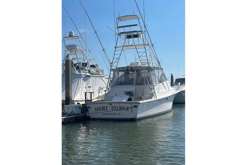  Yacht Photos Pics 1999 Ocean Yachts 48 Express docked in Charleston, SC marina.
