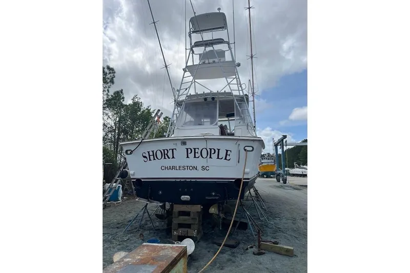  Yacht Photos Pics 1999 Ocean Yachts 48 Express boat named "Short People" in Charleston, SC, on dry dock.