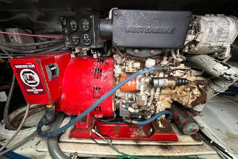  Yacht Photos Pics Engine compartment of a 1999 Ocean Yachts 48 Express with Westerbeke generator.