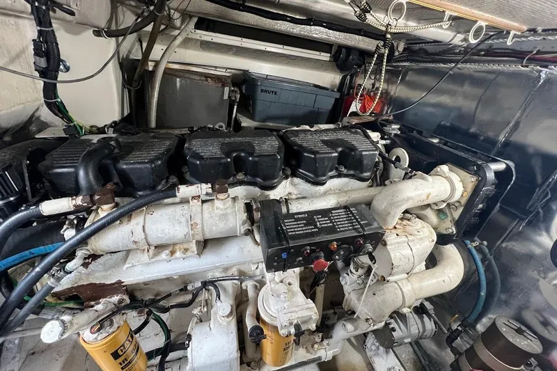  Yacht Photos Pics Engine room of a 1999 Ocean Yachts 48 Express, showcasing mechanical components.