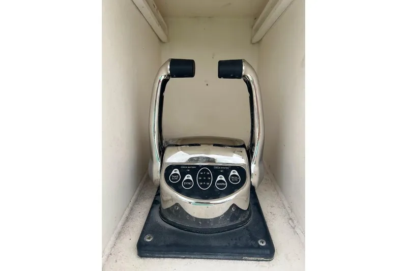  Yacht Photos Pics Throttle controls of a 1999 Ocean Yachts 48 Express boat, featuring dual levers.