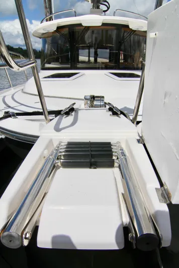  Yacht Photos Pics Ranger Tugs R-29 2020 model boat with a stainless steel swim ladder.