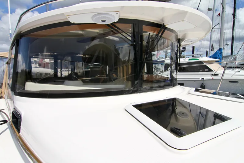  Yacht Photos Pics 2020 Ranger Tugs R-29 boat with large windows and sunroof at a marina.