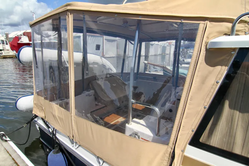  Yacht Photos Pics 2020 Ranger Tugs R-29 boat with enclosed cockpit at marina.