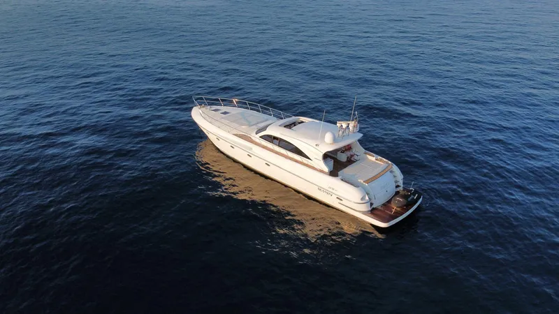  Yacht Photos Pics 2006 Rizzardi 73 yacht cruising on open sea, aerial view.