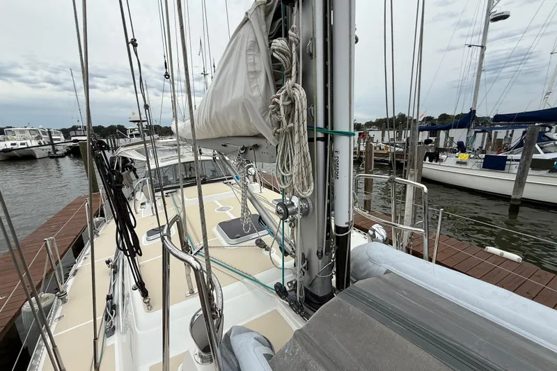 Starlight Yacht Photos Pics Sailboat docked at marina, Outbound 46 model, 2016, with rigging and sails visible.