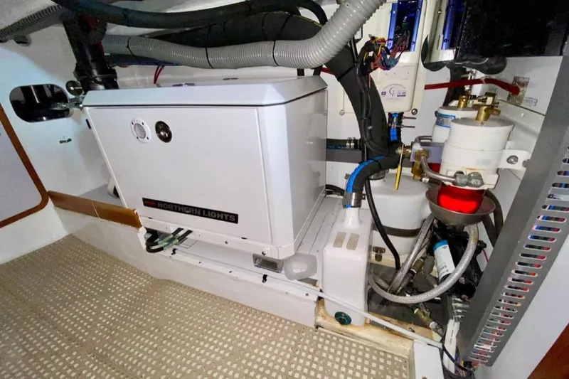 Starlight Yacht Photos Pics Engine room of 2016 Outbound 46 yacht with Northern Lights generator.