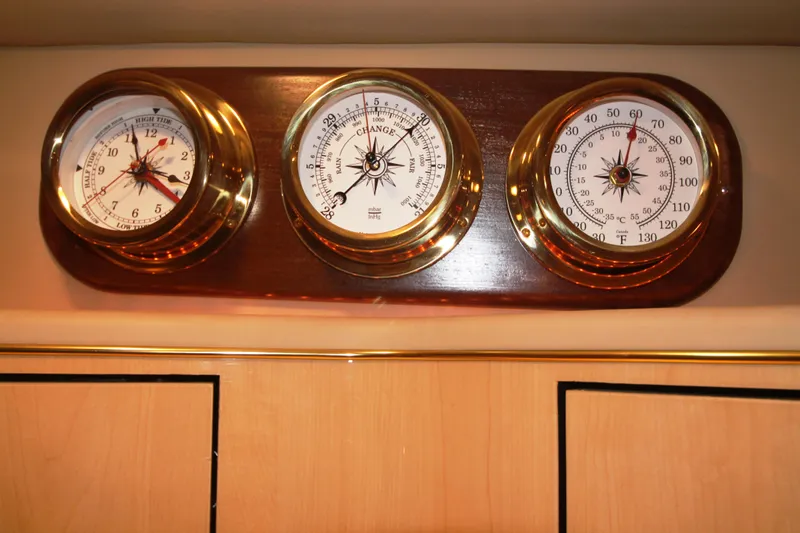 Broke R Yacht Photos Pics Nautical gauges on a 1999 Sea Ray 460 Sundancer boat interior.