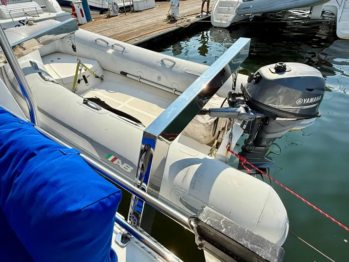 Confetti Yacht Photos Pics Inflatable boat with Yamaha motor docked beside Fountaine Pajot SABA 50, 2016 model.