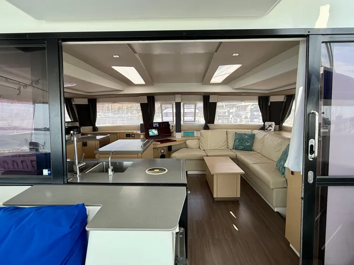 Confetti Yacht Photos Pics Luxurious interior of 2016 Fountaine Pajot SABA 50 catamaran with modern furnishings.