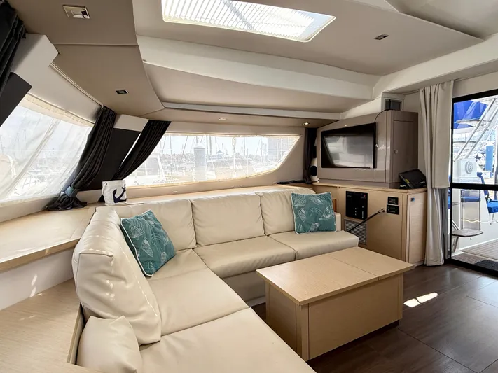 Confetti Yacht Photos Pics Luxurious interior of 2016 Fountaine Pajot SABA 50 catamaran with modern furnishings.