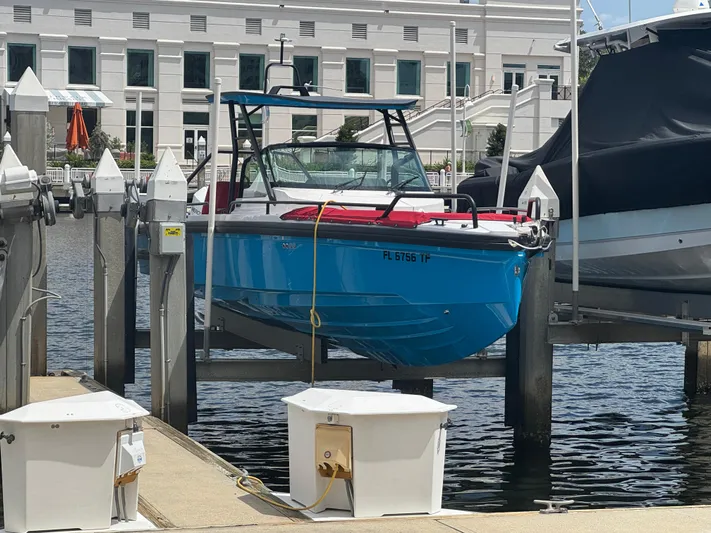  Yacht Photos Pics 2022 Axopar 28 T-top Aft Cabin Brabus Trim docked at marina.
