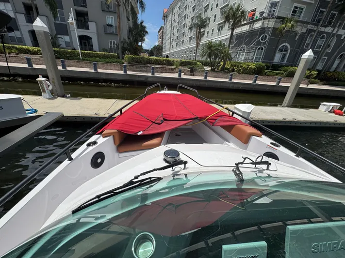  Yacht Photos Pics 2022 Axopar 28 T-top Aft Cabin Brabus Trim docked with red cover.