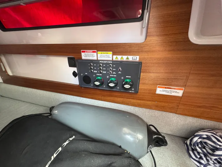 Yacht Photos Pics 2022 Axopar 28 T-top Aft Cabin Brabus Trim interior control panel.